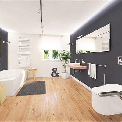 Ein modernes Badezimmer mit Schienensystem Lampen an der Decke.